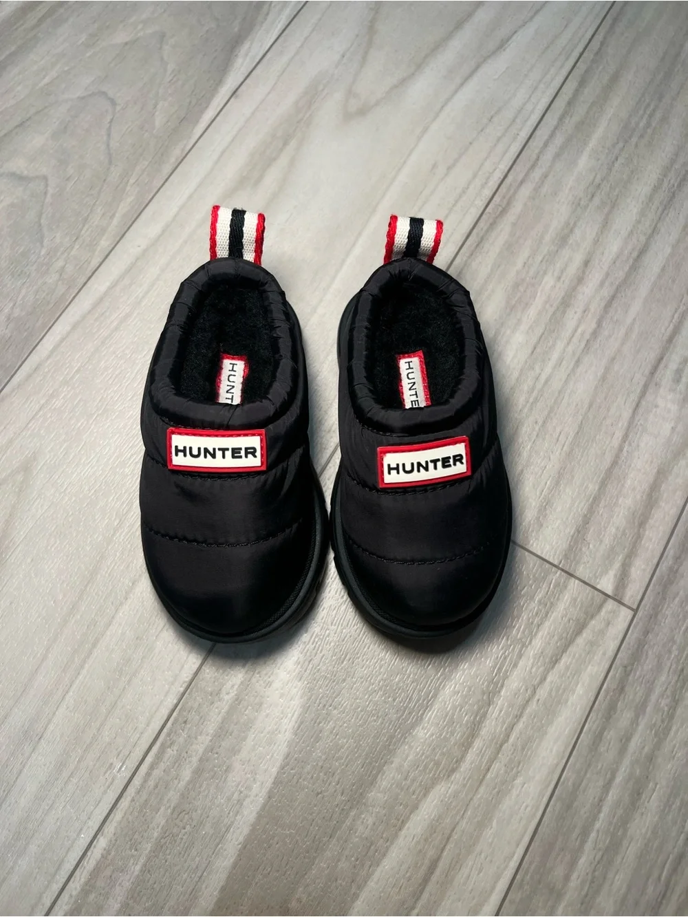 NWOT Hunter Kids Black Slip-On Puff Shoes with Red-Trim Logo